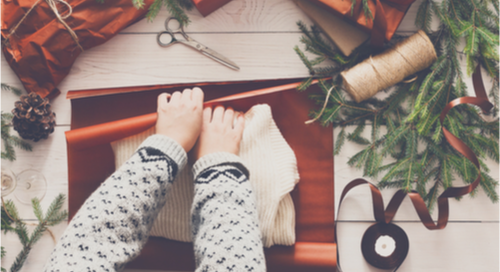 Hands wrapping presents