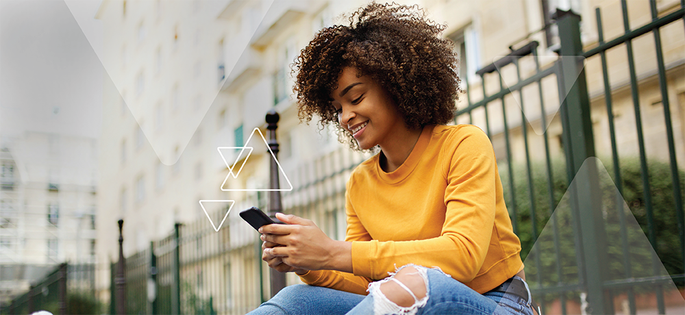 college student on her mobile phone searching for work