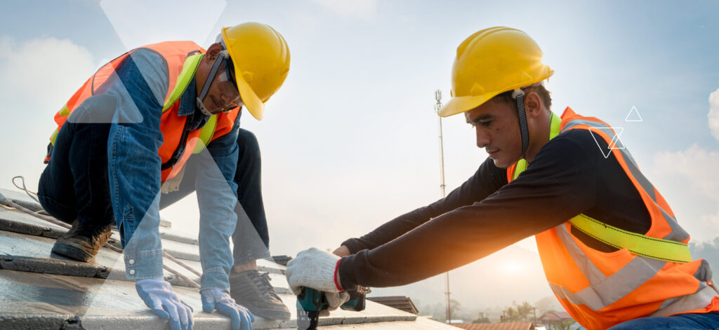 two construction workers on a job site