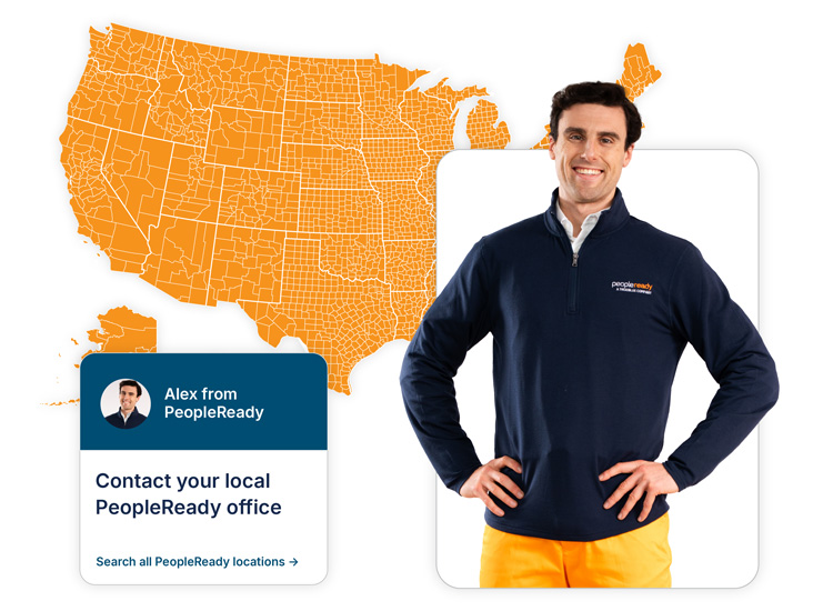 Image of Alex standing next to a map