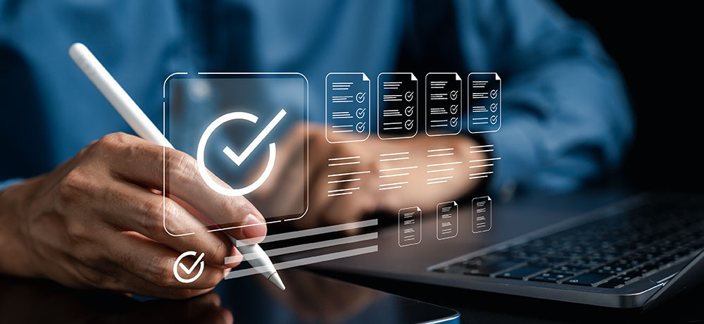 individual writing with a visual check mark